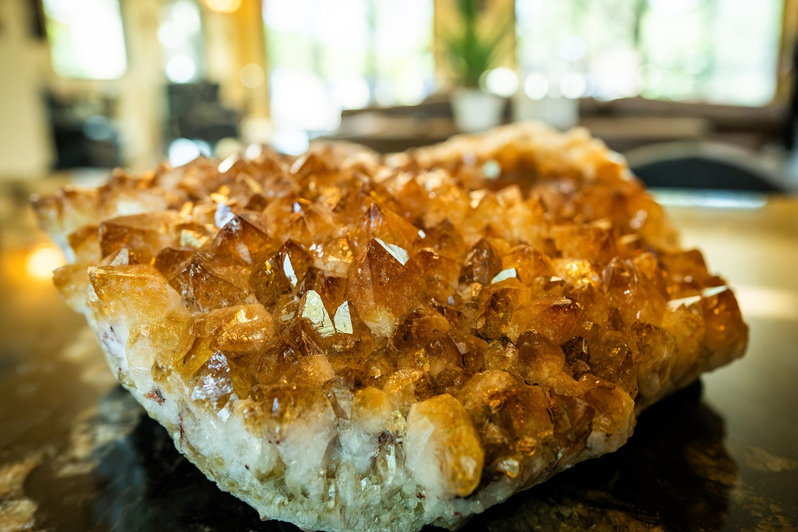 A citrine cluster on the counter